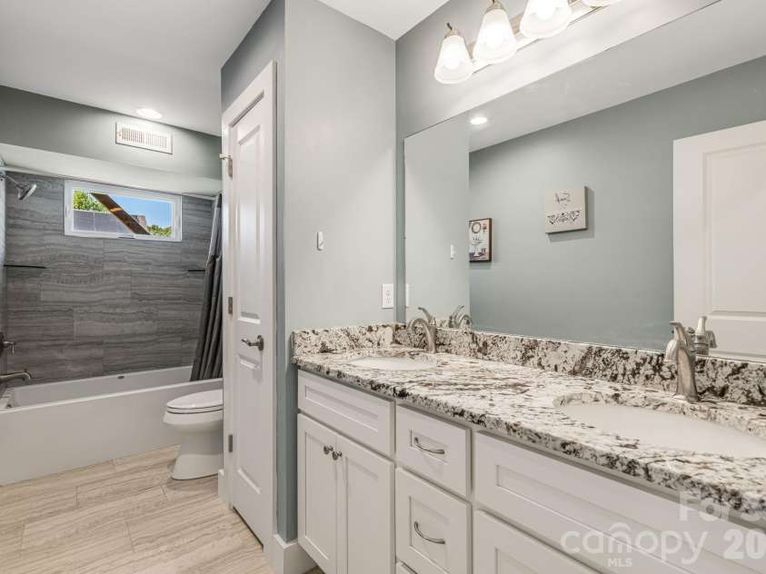 215 Oak Meadow Lane, Asheville, NC 28804.  MLS# CAR4382022, YatesRealty ID 24119. Full Bathroom Downstairs