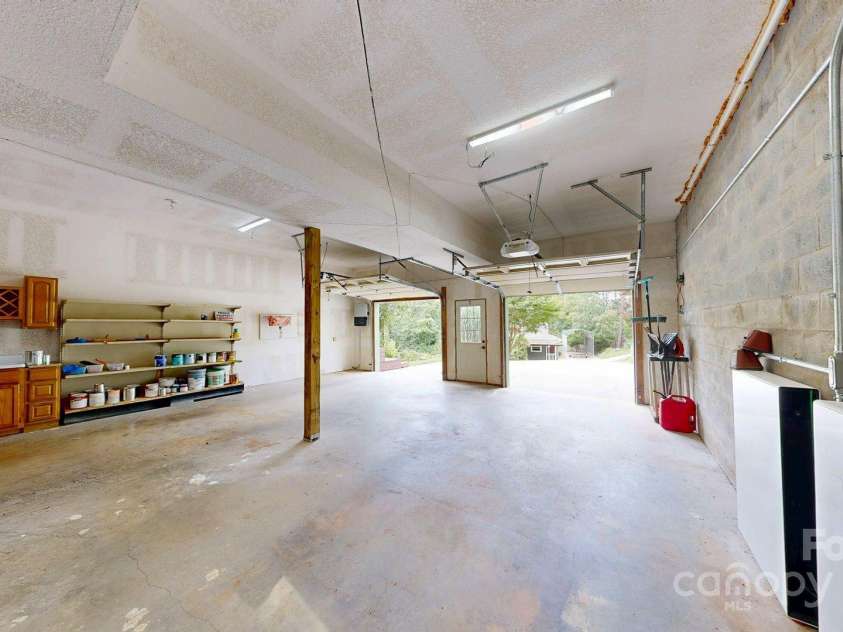 6 Sunrise Valley, Leicester, NC 28748.  MLS# CAR4283211, YatesRealty ID 2412. 2 Car Garage Basement