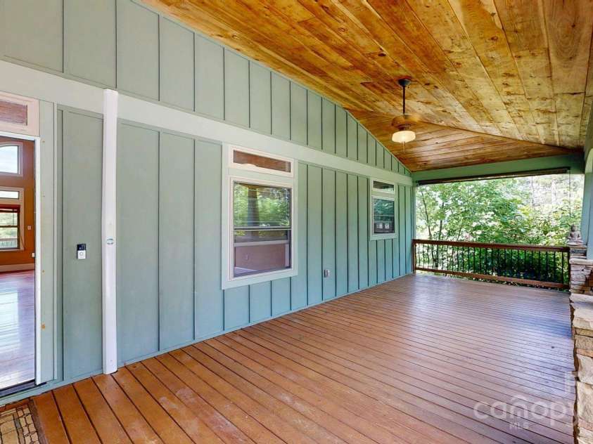 6 Sunrise Valley, Leicester, NC 28748.  MLS# CAR4283211, YatesRealty ID 2412. Lower 50ft covered Deck from master bedroom