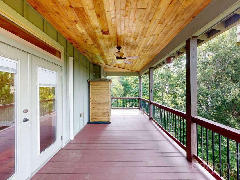 6 Sunrise Valley, Leicester, NC 28748.  MLS# CAR4283211, YatesRealty ID 2412. Main Floor Covered Deck with Infared Sauna
