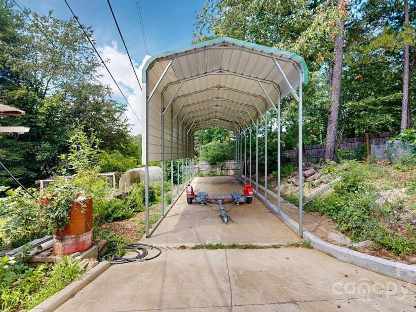 6 Sunrise Valley, Leicester, NC 28748.  MLS# CAR4283211, YatesRealty ID 2412. RV Carport, Greenhouse and Gardens