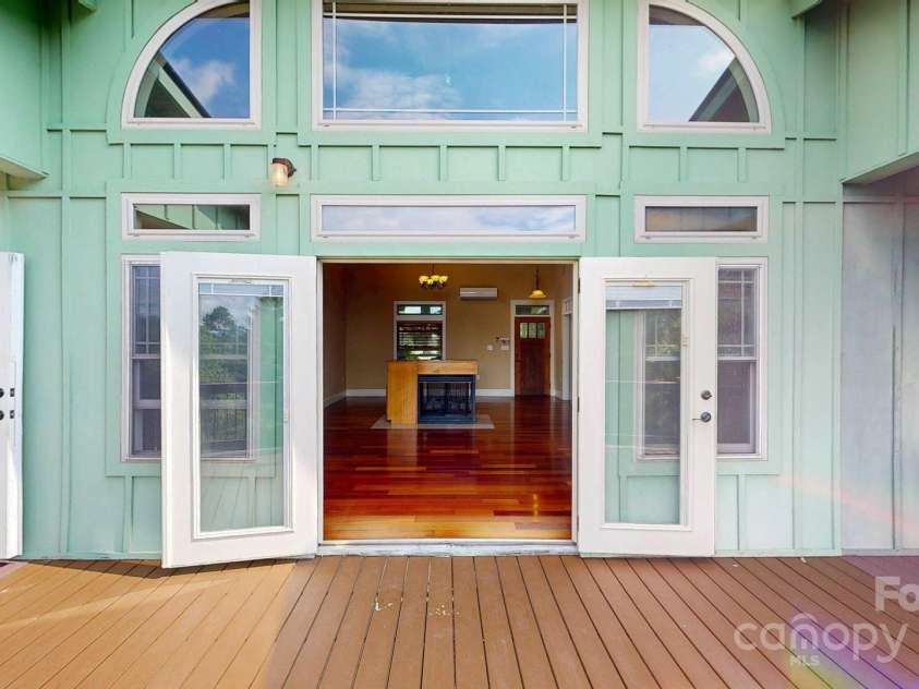 6 Sunrise Valley, Leicester, NC 28748.  MLS# CAR4283211, YatesRealty ID 2412. View in Living Room from deck