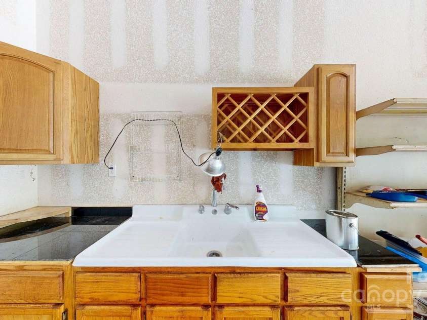 6 Sunrise Valley, Leicester, NC 28748.  MLS# CAR4283211, YatesRealty ID 2412. Work Area in garage