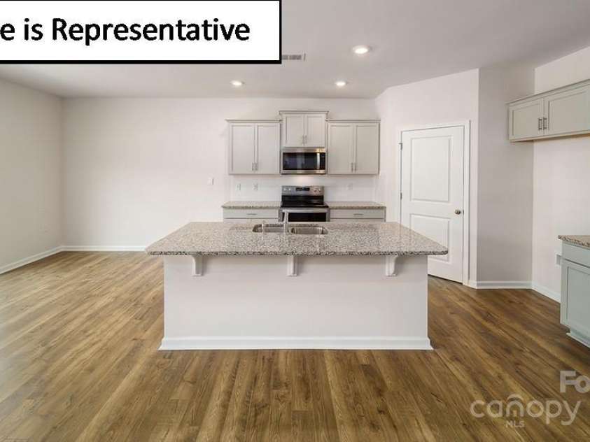 7705 Woolsey Drive, Gastonia, NC 28056.  MLS# CAR4276172, YatesRealty ID 24121. 