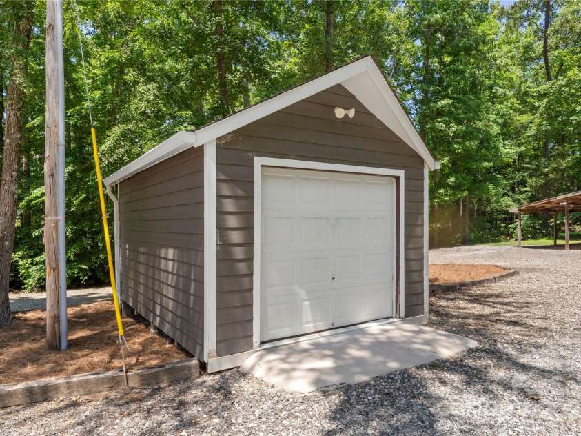 1556 Stanley Lucia Road, Mount Holly, NC 28120.  MLS# CAR4273688, YatesRealty ID 24123. Detached Garage/Shed with electricity