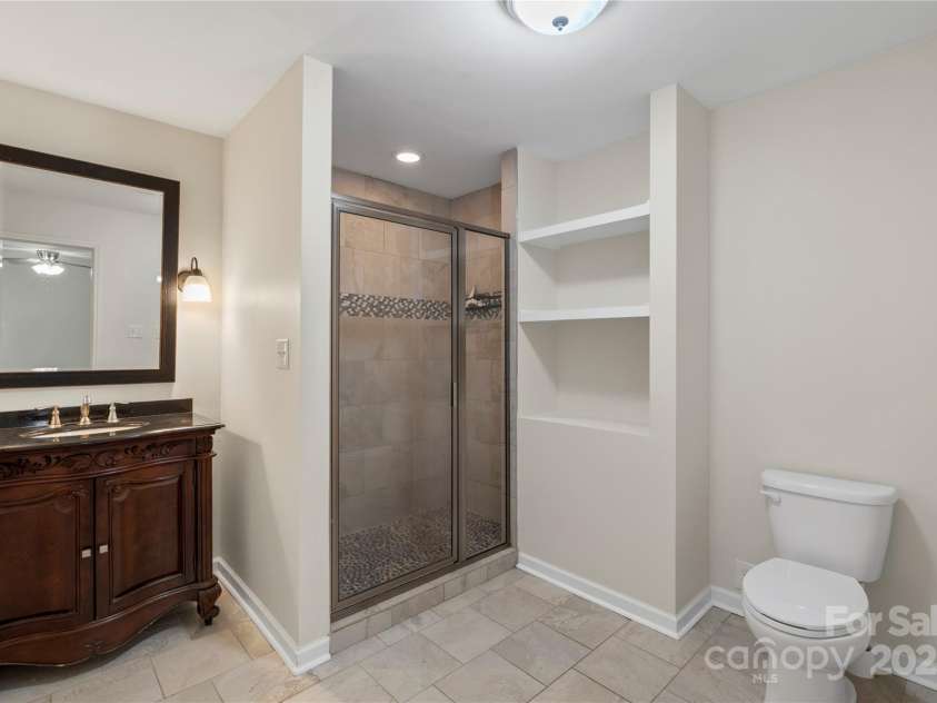 1556 Stanley Lucia Road, Mount Holly, NC 28120.  MLS# CAR4273688, YatesRealty ID 24123. Ensuite Full Bathroom