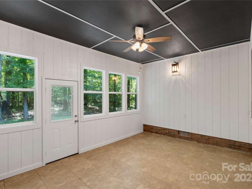 1556 Stanley Lucia Road, Mount Holly, NC 28120.  MLS# CAR4273688, YatesRealty ID 24123. Heated Sunroom