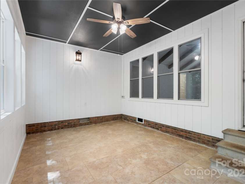 1556 Stanley Lucia Road, Mount Holly, NC 28120.  MLS# CAR4273688, YatesRealty ID 24123. Heated Sunroom