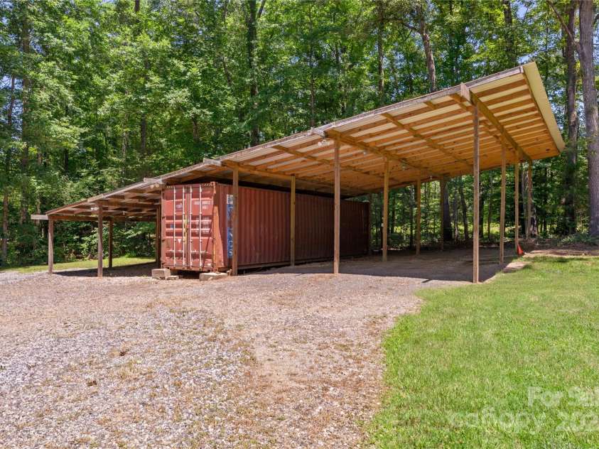 1556 Stanley Lucia Road, Mount Holly, NC 28120.  MLS# CAR4273688, YatesRealty ID 24123. Pole Barn Pavilion w/ electricity and additional storage