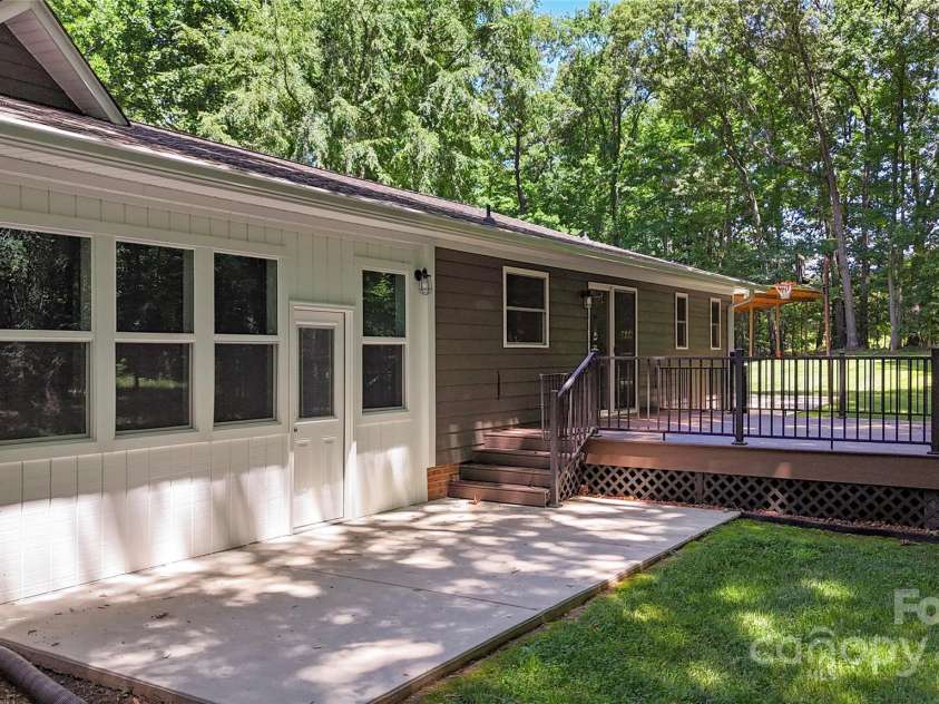 1556 Stanley Lucia Road, Mount Holly, NC 28120.  MLS# CAR4273688, YatesRealty ID 24123. Rear Patio