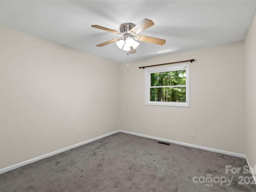 1556 Stanley Lucia Road, Mount Holly, NC 28120.  MLS# CAR4273688, YatesRealty ID 24123. Spare Bedroom 3