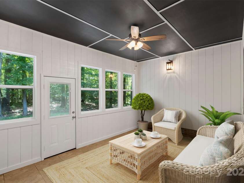 1556 Stanley Lucia Road, Mount Holly, NC 28120.  MLS# CAR4273688, YatesRealty ID 24123. Sunroom virtually staged