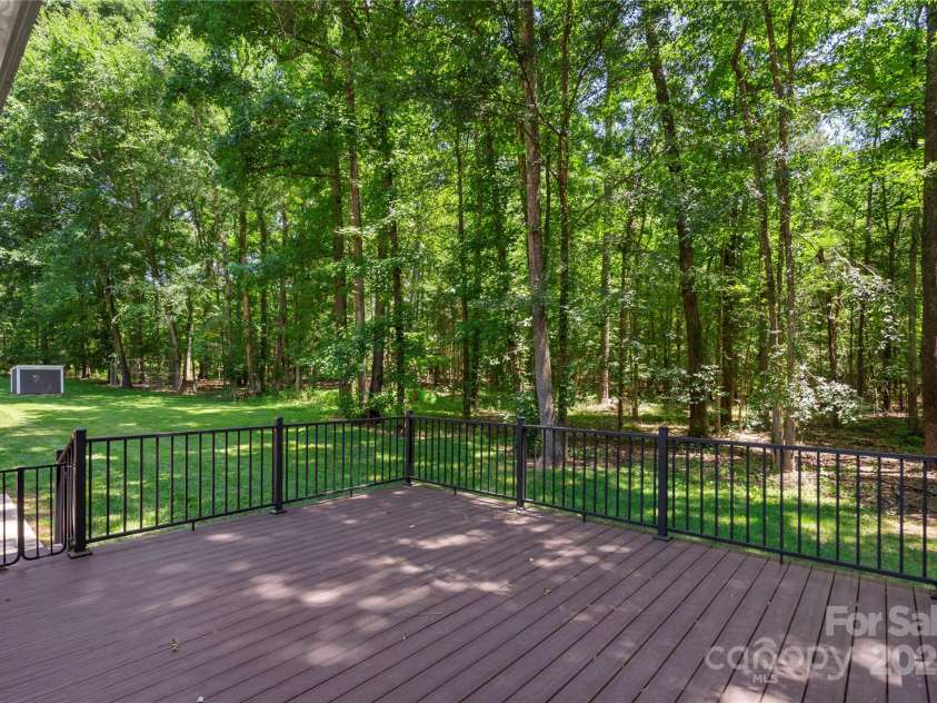 1556 Stanley Lucia Road, Mount Holly, NC 28120.  MLS# CAR4273688, YatesRealty ID 24123. Trex Rear Deck