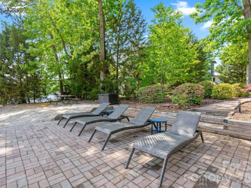 450 Greenbay Road, Mooresville, NC 28117.  MLS# CAR4375100, YatesRealty ID 24123. Lakeside seating 