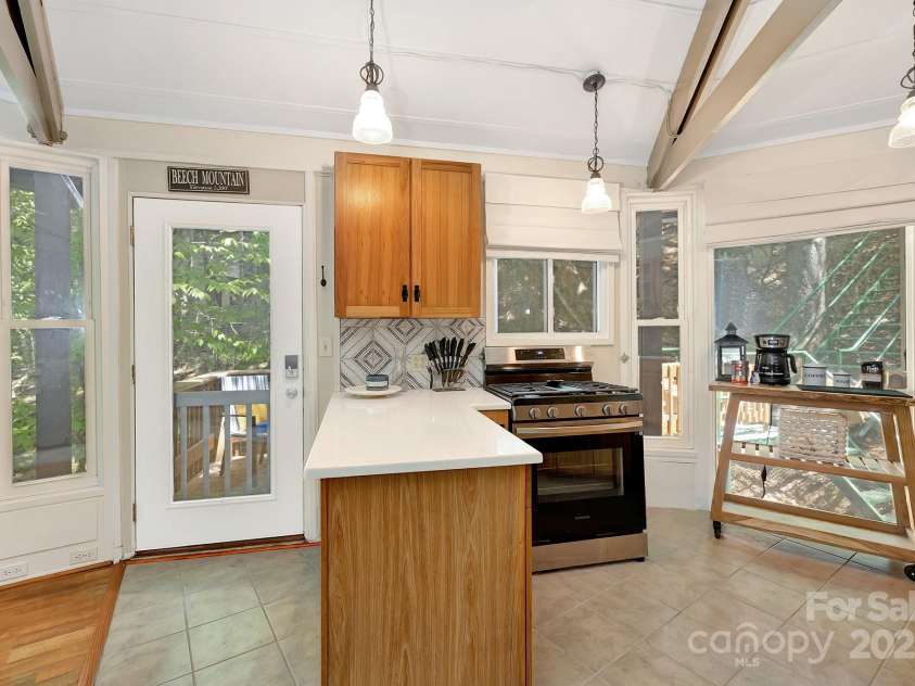 125 Pond Creek Road, Beech Mountain, NC 28604.  MLS# CAR4275348, YatesRealty ID 24128. 