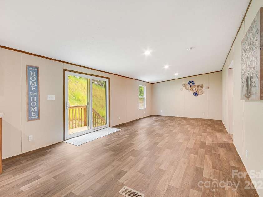 2191 Deep Gap Road, Flat Rock, NC 28731.  MLS# CAR4254612, YatesRealty ID 24129. Dining area and backdoor