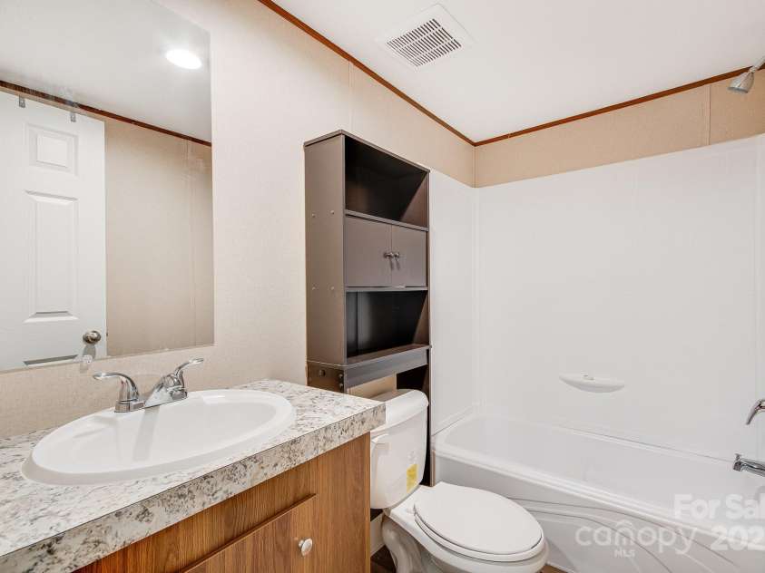 2191 Deep Gap Road, Flat Rock, NC 28731.  MLS# CAR4254612, YatesRealty ID 24129. Guest Bathroom