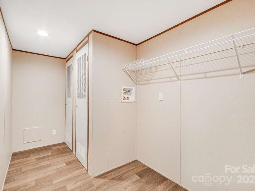 2191 Deep Gap Road, Flat Rock, NC 28731.  MLS# CAR4254612, YatesRealty ID 24129. Laundry room with utility closets