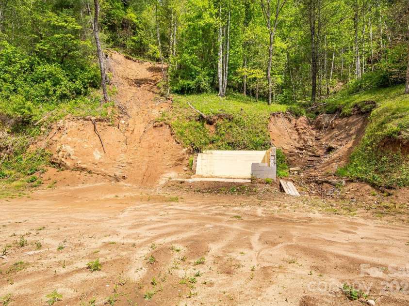 2191 Deep Gap Road, Flat Rock, NC 28731.  MLS# CAR4254612, YatesRealty ID 24129. Previous home site