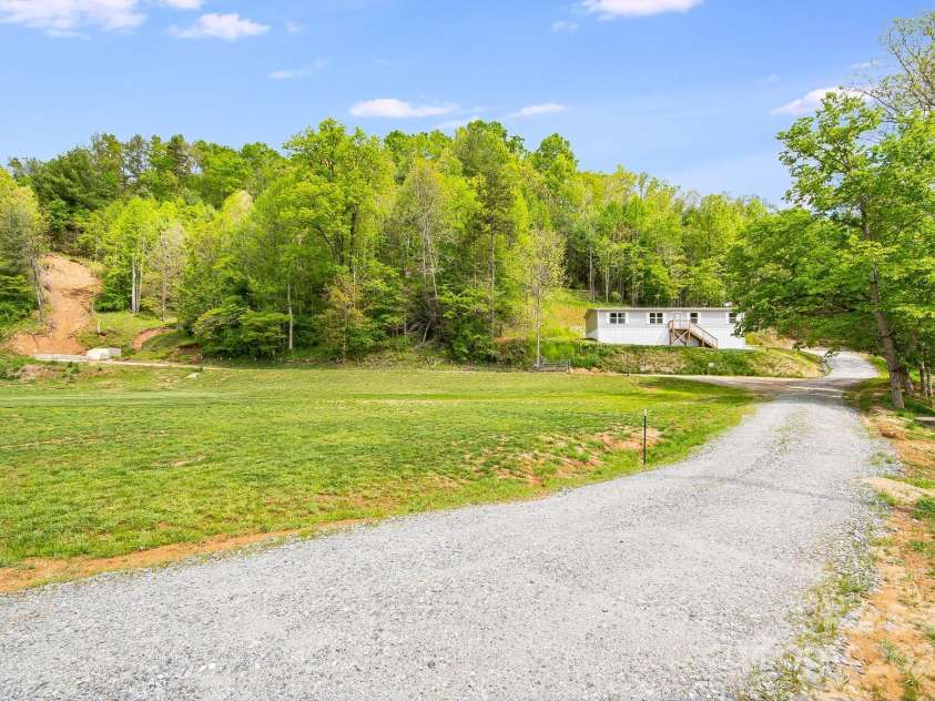 2191 Deep Gap Road, Flat Rock, NC 28731.  MLS# CAR4254612, YatesRealty ID 24129. Welcome home!