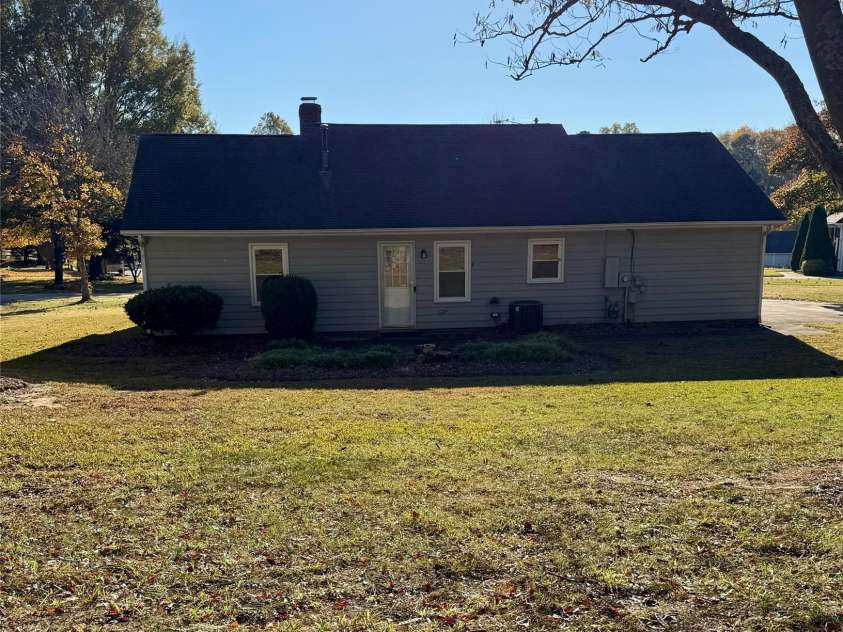 2238 Swain Court, Gastonia, NC 28054.  MLS# CAR4320204, YatesRealty ID 2413. Back view w/ patio