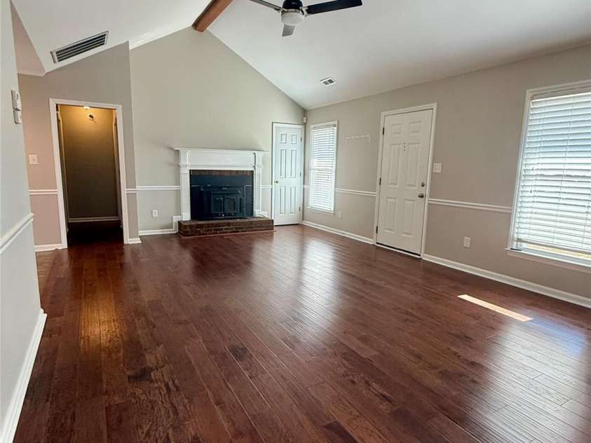 2238 Swain Court, Gastonia, NC 28054.  MLS# CAR4320204, YatesRealty ID 2413. Living room w/ vaulted ceiling, wood beam, new ceiling fan