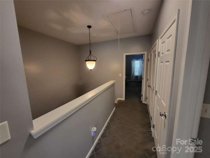 9323 Lenox Pointe Drive, Charlotte, NC 28273.  MLS# CAR4210619, YatesRealty ID 2413. 3 Level Hall