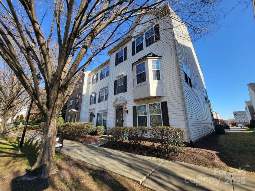 9323 Lenox Pointe Drive, Charlotte, NC 28273.  MLS# CAR4210619, YatesRealty ID 2413. Front side view of the home