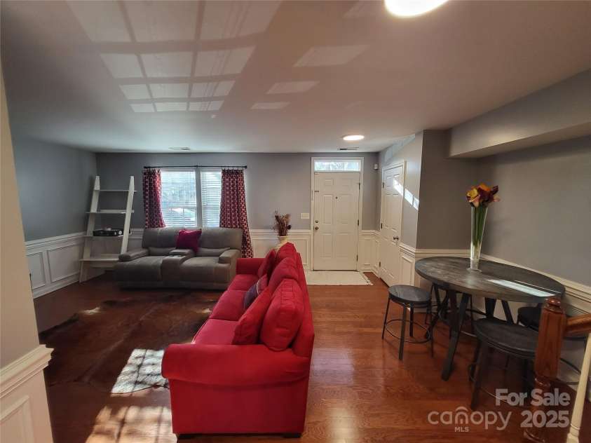 9323 Lenox Pointe Drive, Charlotte, NC 28273.  MLS# CAR4210619, YatesRealty ID 2413. Main Level Living Room