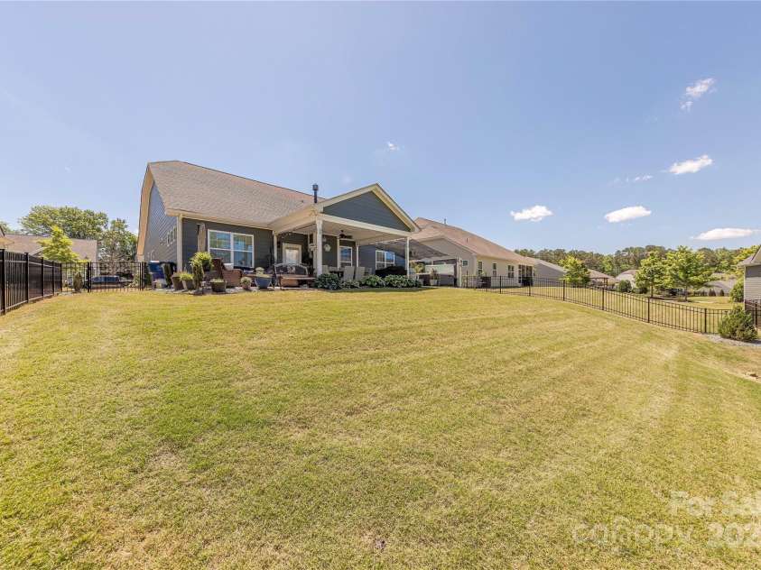 1022 Curling Creek Drive, Indian Trail, NC 28079.  MLS# CAR4255571, YatesRealty ID 24131. Large Backyard