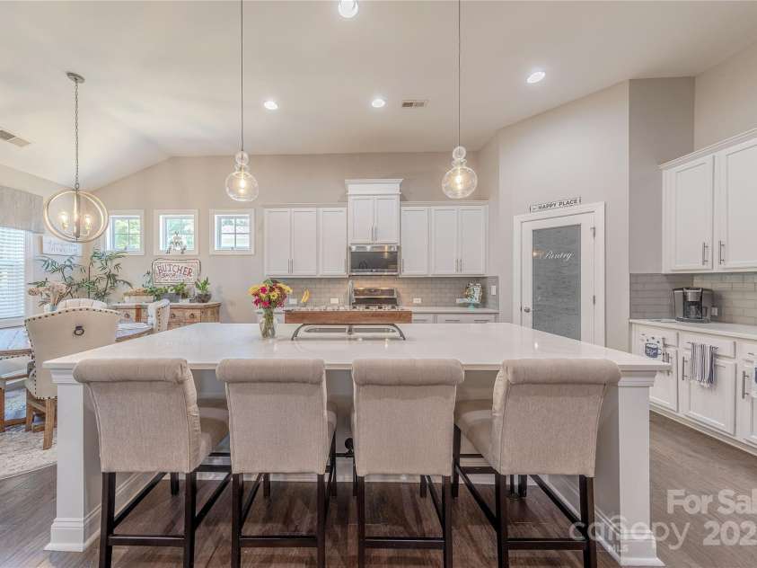 1022 Curling Creek Drive, Indian Trail, NC 28079.  MLS# CAR4255571, YatesRealty ID 24131. Large Kitchen Island seats four