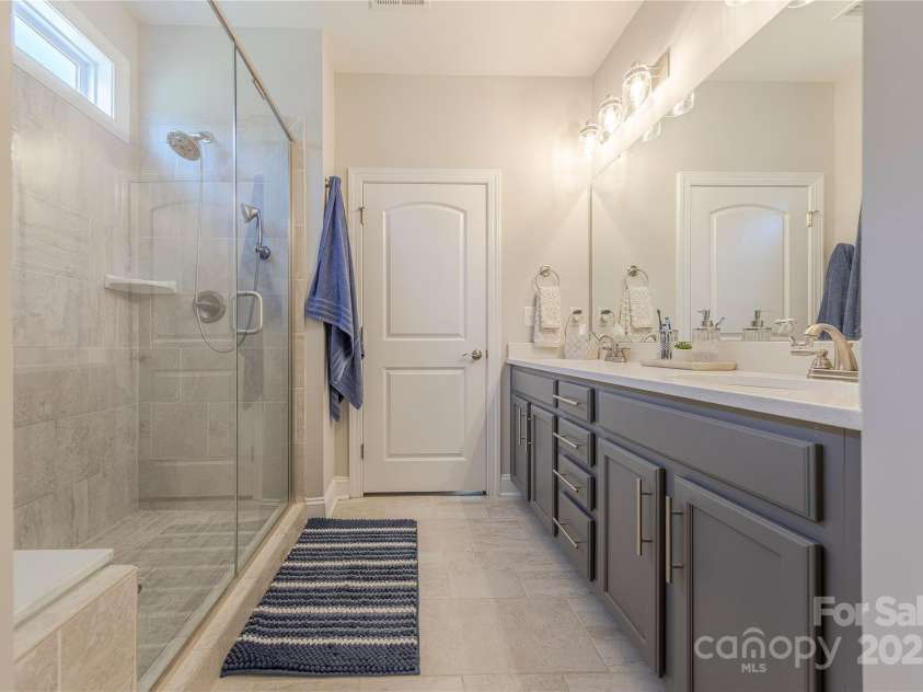 1022 Curling Creek Drive, Indian Trail, NC 28079.  MLS# CAR4255571, YatesRealty ID 24131. Large Walk in shower