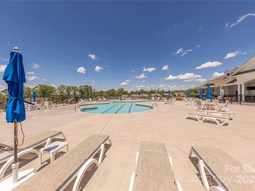 1022 Curling Creek Drive, Indian Trail, NC 28079.  MLS# CAR4255571, YatesRealty ID 24131. Lots of seating on the pool deck