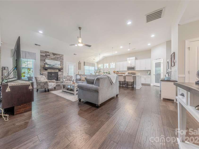 1022 Curling Creek Drive, Indian Trail, NC 28079.  MLS# CAR4255571, YatesRealty ID 24131. Stone Fireplace in the Great Room