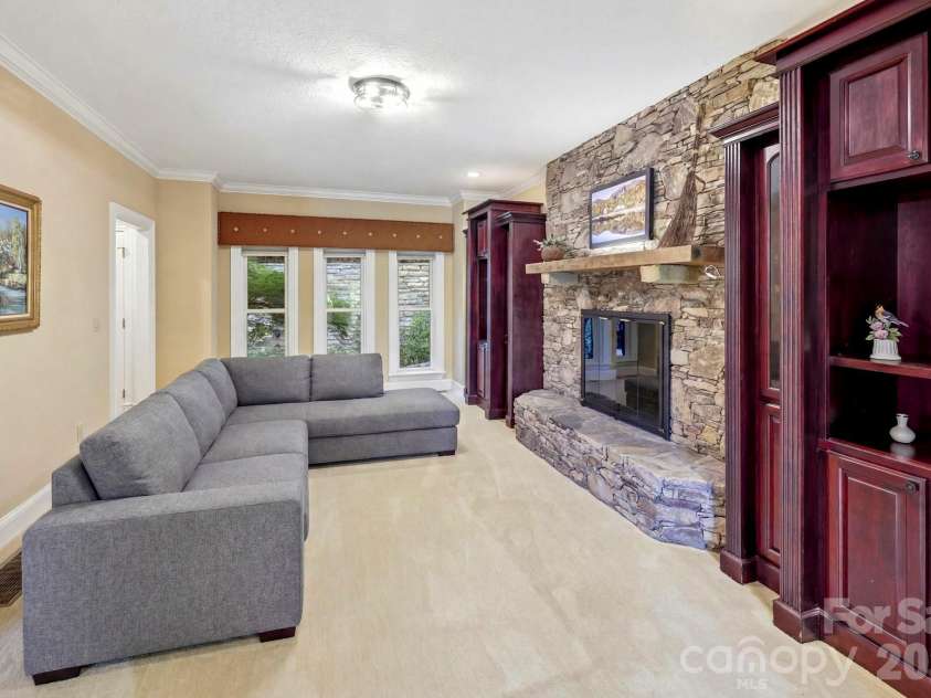 151 Garner Drive, Lake Lure, NC 28746.  MLS# CAR4382445, YatesRealty ID 24131. AI staged