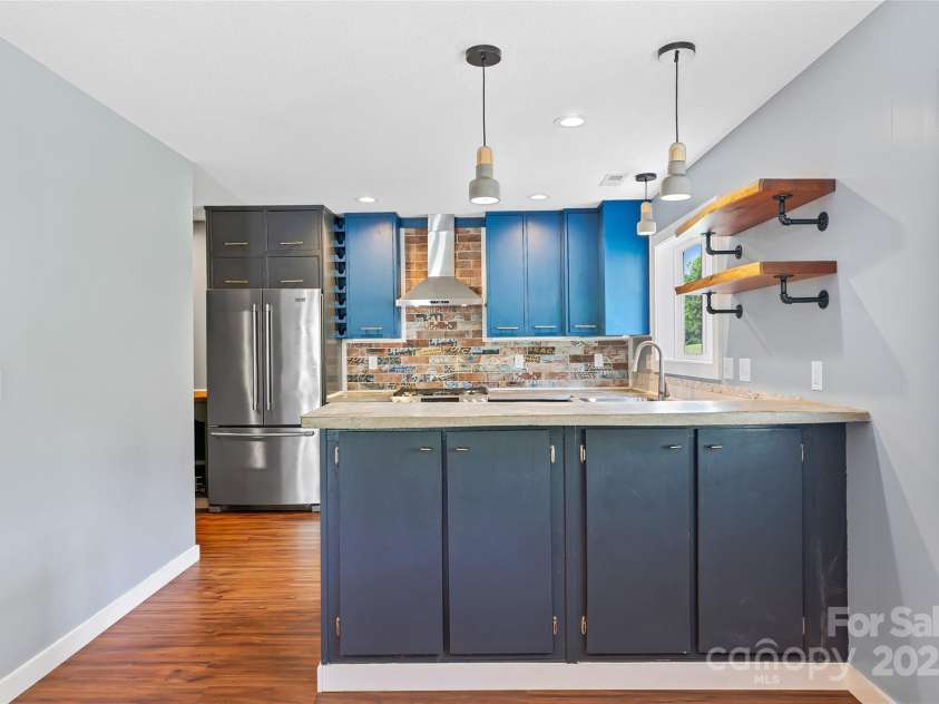 344 Hemlock Springs Trail, Weaverville, NC 28787.  MLS# CAR4271201, YatesRealty ID 24133. Kitchen from Dining Room