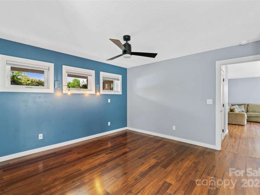344 Hemlock Springs Trail, Weaverville, NC 28787.  MLS# CAR4271201, YatesRealty ID 24133. Primary En-suite main level which is private and allows the beauty of the property and privacy.