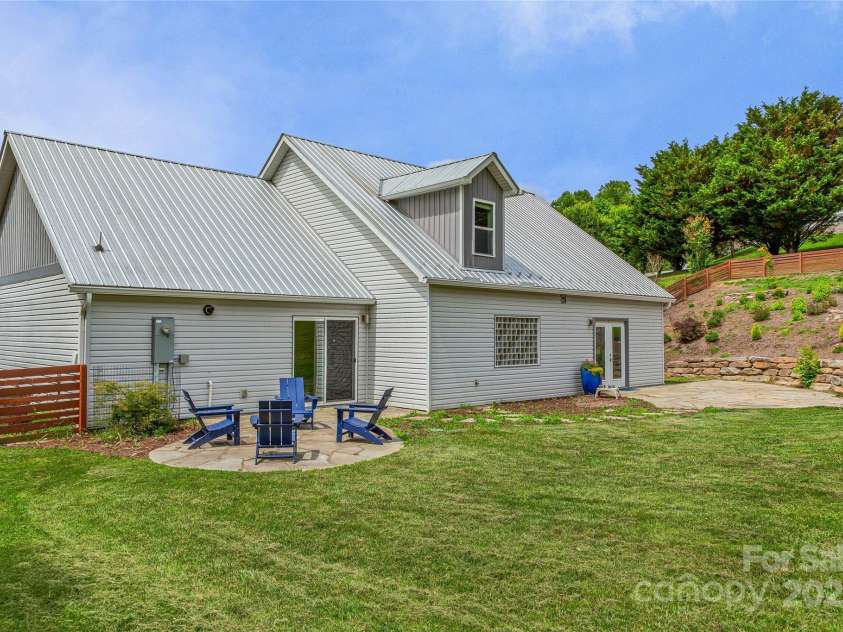 344 Hemlock Springs Trail, Weaverville, NC 28787.  MLS# CAR4271201, YatesRealty ID 24133. Well thought out home, fenced yard, gardens and more.