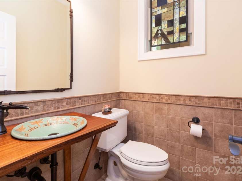 39 Hawks Pointe Lane, Weaverville, NC 28787.  MLS# CAR4228762, YatesRealty ID 24134. Half bath on the main floor