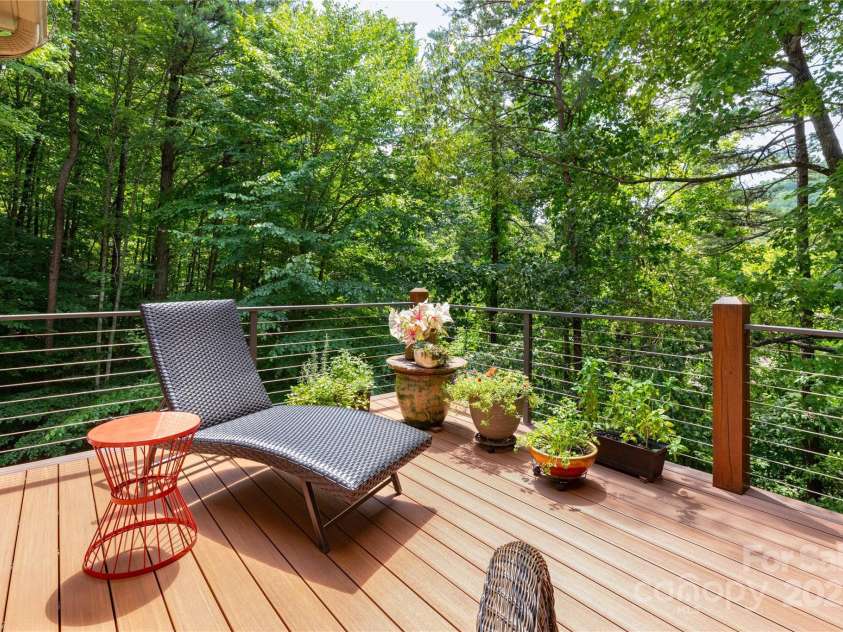 39 Hawks Pointe Lane, Weaverville, NC 28787.  MLS# CAR4228762, YatesRealty ID 24134. Main floor deck in the summer
