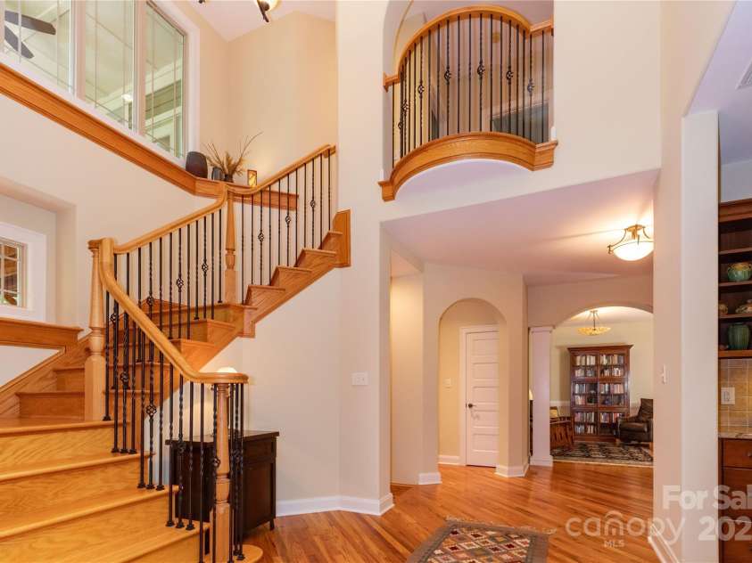 39 Hawks Pointe Lane, Weaverville, NC 28787.  MLS# CAR4228762, YatesRealty ID 24134. Stairs leading to the upper level with Juliet balcony
