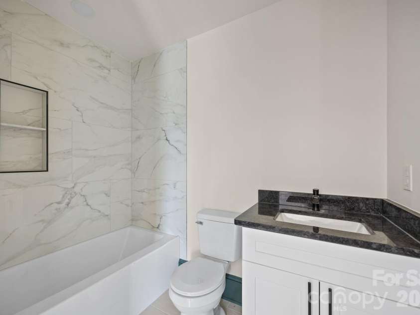 63 Elizabeth Place, Asheville, NC 28801.  MLS# CAR4360170, YatesRealty ID 24139. Second Bathroom