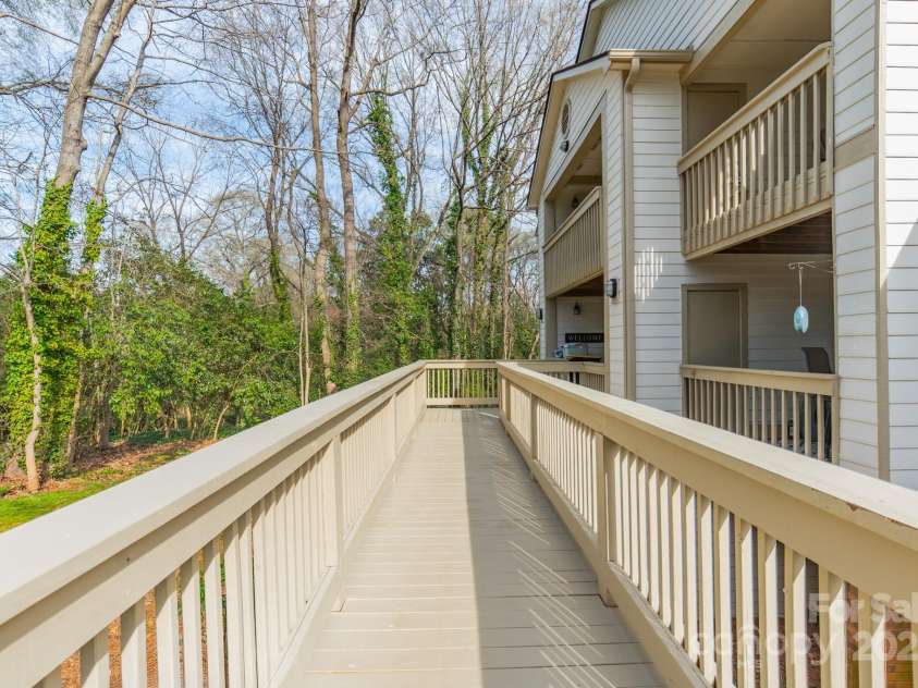 1001 Churchill Downs Court, Charlotte, NC 28211.  MLS# CAR4235260, YatesRealty ID 2414. Ramp/ walkway for easy access to the condo.