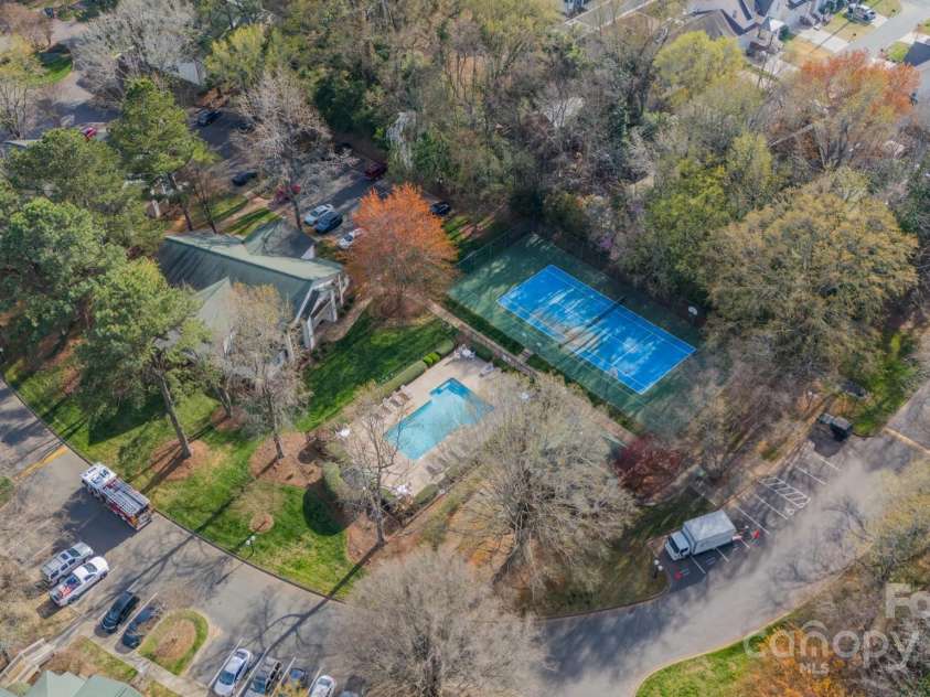 1001 Churchill Downs Court, Charlotte, NC 28211.  MLS# CAR4235260, YatesRealty ID 2414. View of pool and tennis courts.