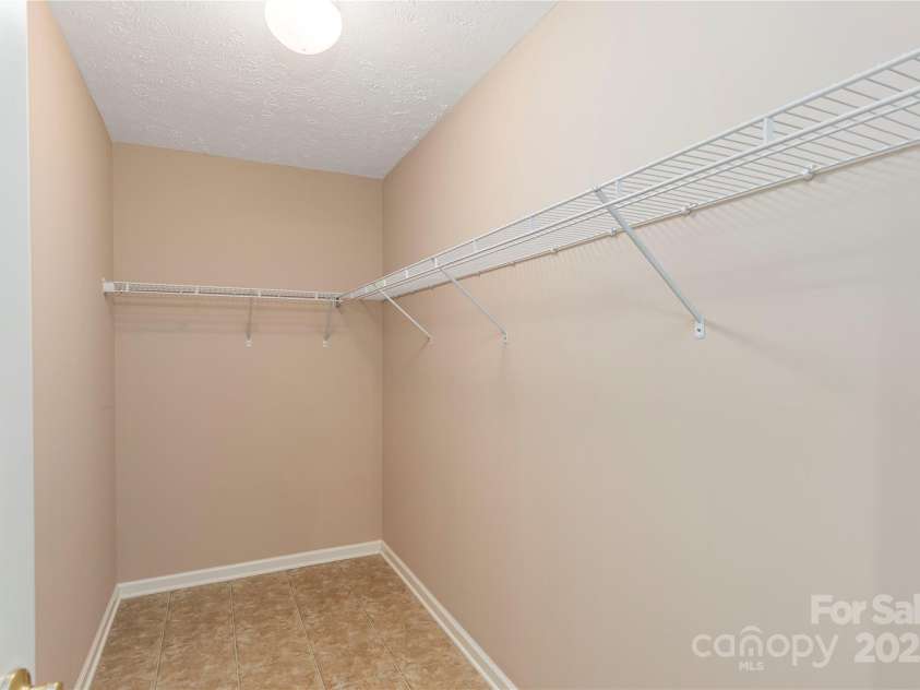 190 Shaws Creek Farm Road, Hendersonville, NC 28739.  MLS# CAR4272994, YatesRealty ID 24143. Walk in Closet #2-Lower Level