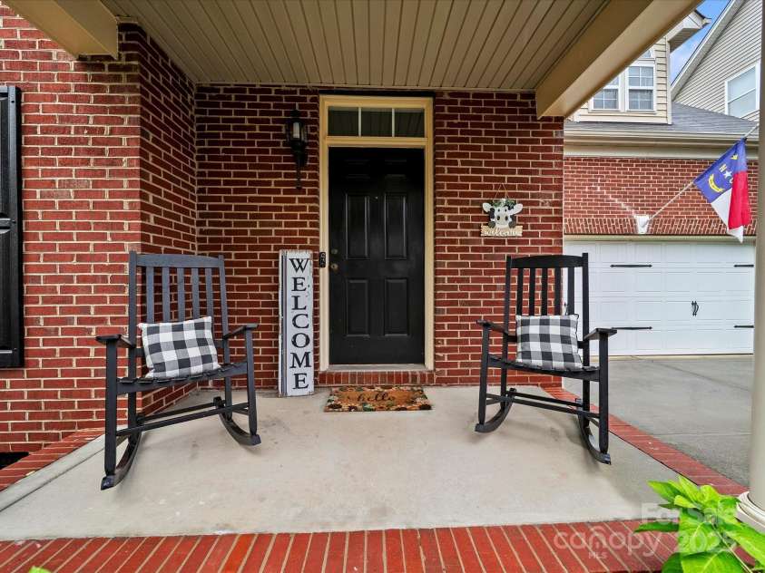 8004 Fountainbrook Drive, Indian Trail, NC 28079.  MLS# CAR4287908, YatesRealty ID 24146. Come sit on the porch!