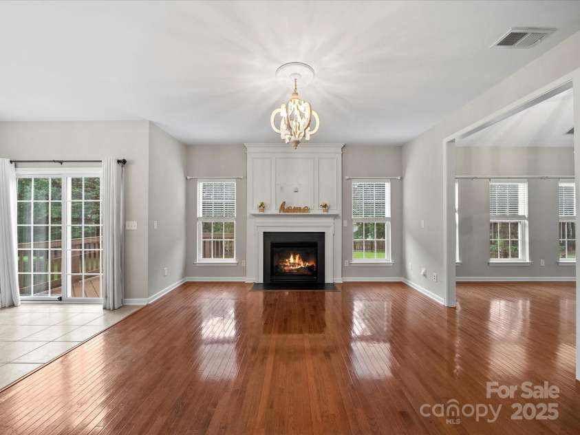 8004 Fountainbrook Drive, Indian Trail, NC 28079.  MLS# CAR4287908, YatesRealty ID 24146. Family room w/fireplace