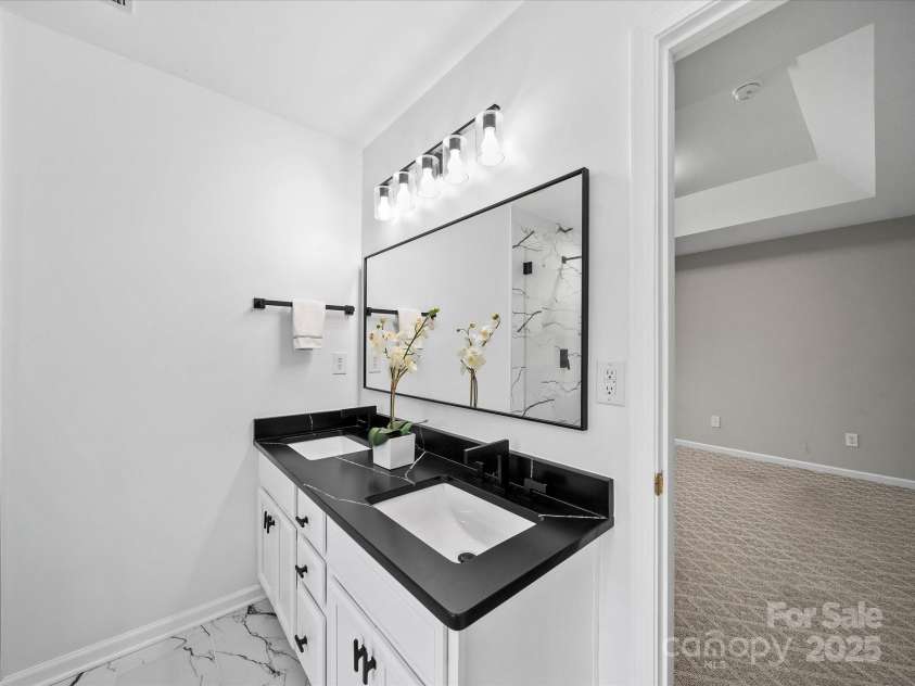 8004 Fountainbrook Drive, Indian Trail, NC 28079.  MLS# CAR4287908, YatesRealty ID 24146. Primary Reno'd bath