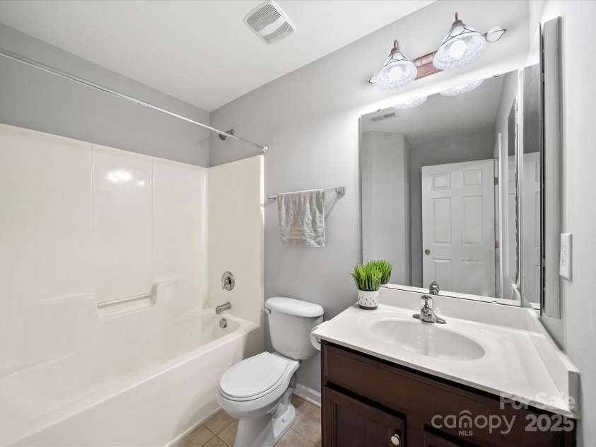 8004 Fountainbrook Drive, Indian Trail, NC 28079.  MLS# CAR4287908, YatesRealty ID 24146. Upper Level Hall Bath