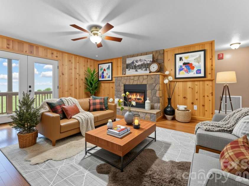 1268 Coon Creek Road, Franklin, NC 28734.  MLS# CAR4351679, YatesRealty ID 2415. Main floor living room Virtually Staged